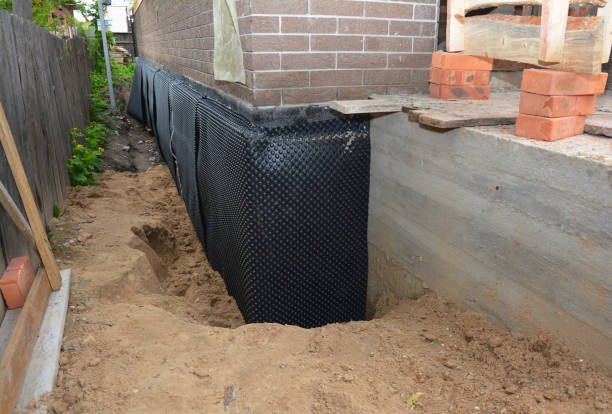 Happy homeowners after waterproofing job in Richwood